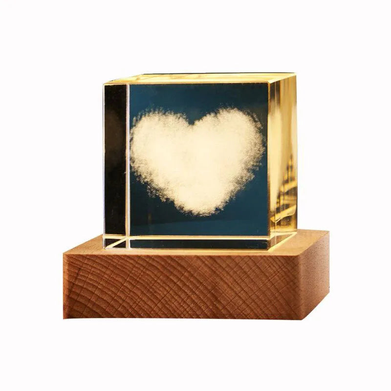 3D crystal cube night lamp showing transparent glass with internal engraving and warm light illumination