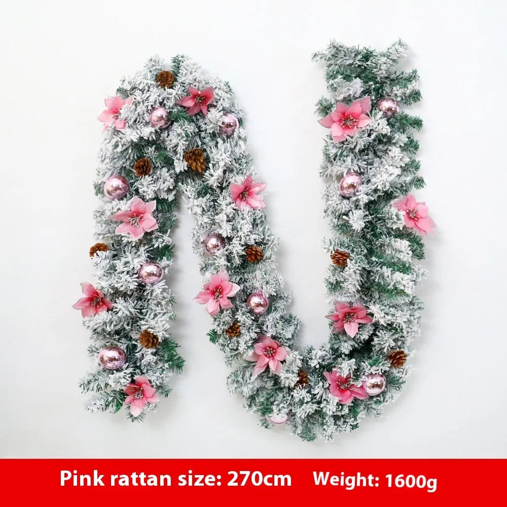 PVC Christmas rattan garland with flocked decoration in golden colour, draped as a festive vine.