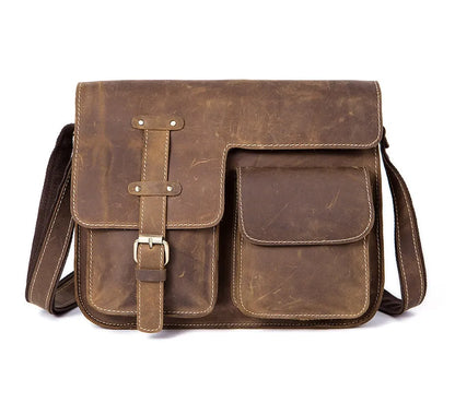 Leather vintage messenger bag in black with adjustable crossbody strap and brass buckle