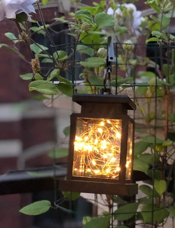 Black solar wind lamp, ABS plastic, 90mm diameter, 128mm height, warm white LED, IPX4 waterproof, for outdoor courtyard use.