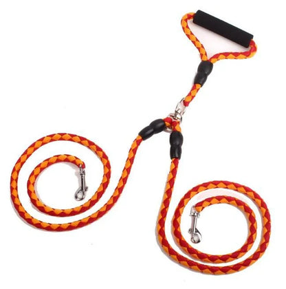 Double-ended dog walking rope with padded handles and reflective threads, showing metal clip hooks