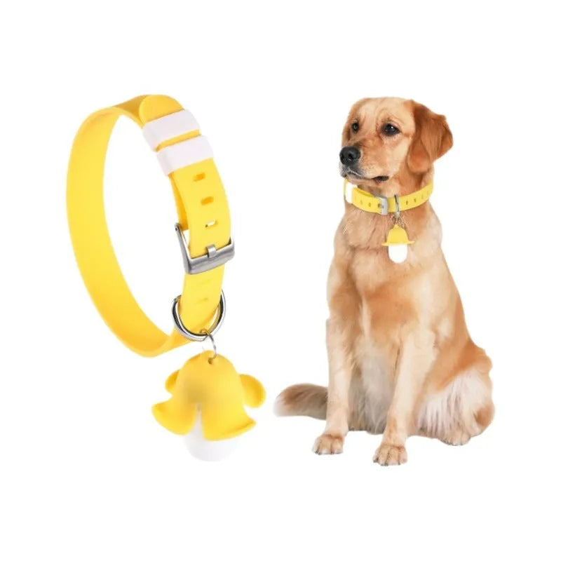 Yellow banana-shaped USB rechargeable dog collar light with LED illumination and magnetic charging contacts
