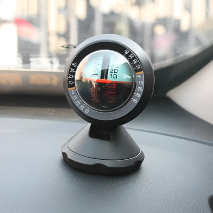 Black vehicle mounted slope meter on dashboard showing inclination measurement