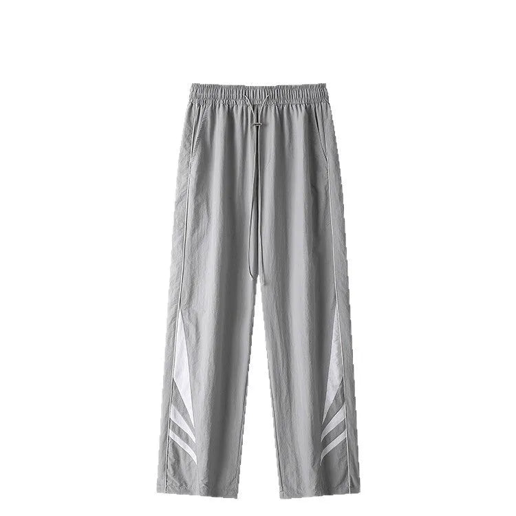 Men's black straight-leg trousers with non-iron fabric, elastic waistband, and plus sizes for summer wear