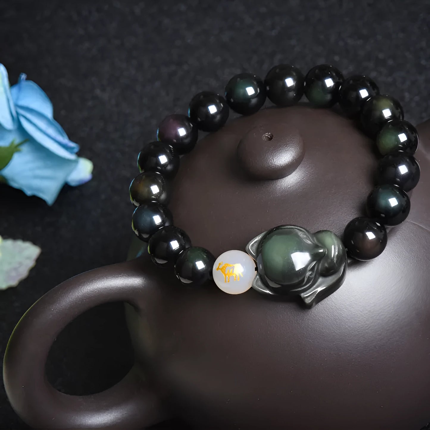 Natural obsidian beaded bracelet with 10mm stones in gold, silver, or black style.