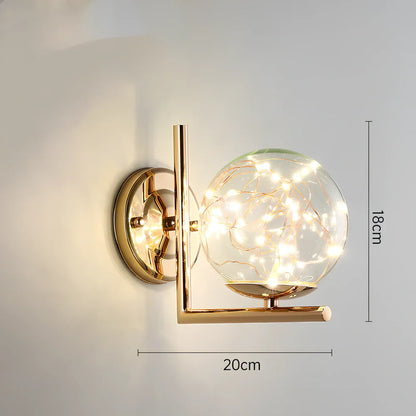 Crystal bedside lamp with stainless steel base and transparent shade providing soft illumination