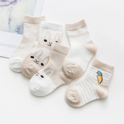 Premium cotton baby socks in various vibrant colors and sizes for boys and girls