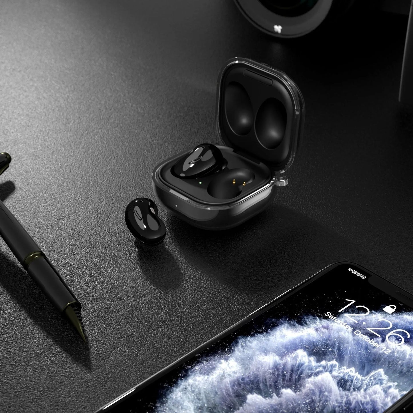 Transparent clamshell-style Bluetooth earphone case in translucent black, gold, purple, and clear colours.