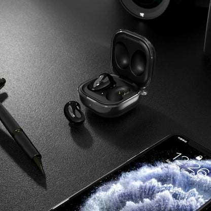 Transparent clamshell-style Bluetooth earphone case in translucent black, gold, purple, and clear colours.