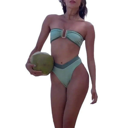 Women's fluorescent green bikini swimsuit with sleeveless top and briefs.