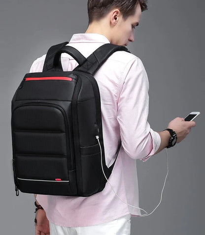 A sleek and versatile waterproof backpack with a USB charging port, perfect for the modern professional on the go.