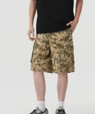 American-style loose-fit camouflage shorts in a cropped length on a neutral background.