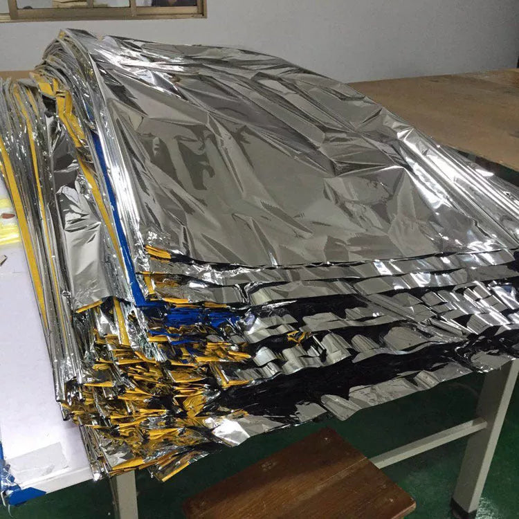 Disposable emergency sleeping bag for cold weather camping and hiking