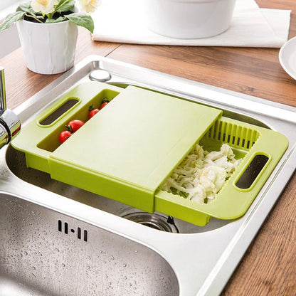 Multifunctional cutting board with integrated strainer and storage tray, made of durable PP material with flexible, rake-shaped body for comfortable chopping