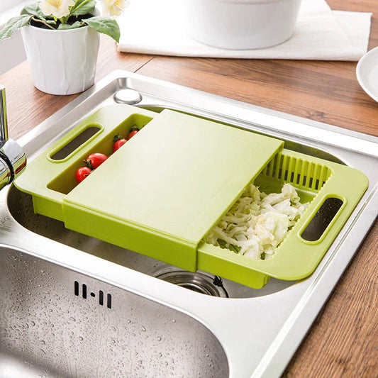 Multifunctional cutting board with integrated strainer and storage tray, made of durable PP material with flexible, rake-shaped body for comfortable chopping