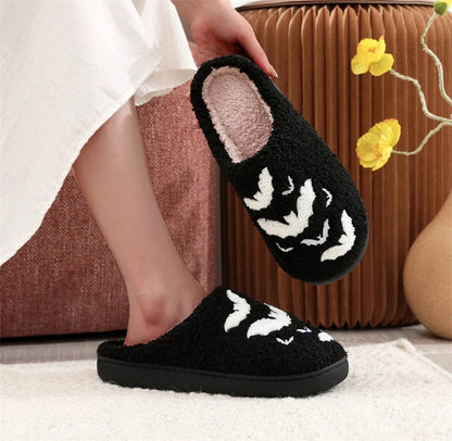 Halloween bat design plush slippers for indoor wear, available in white and black