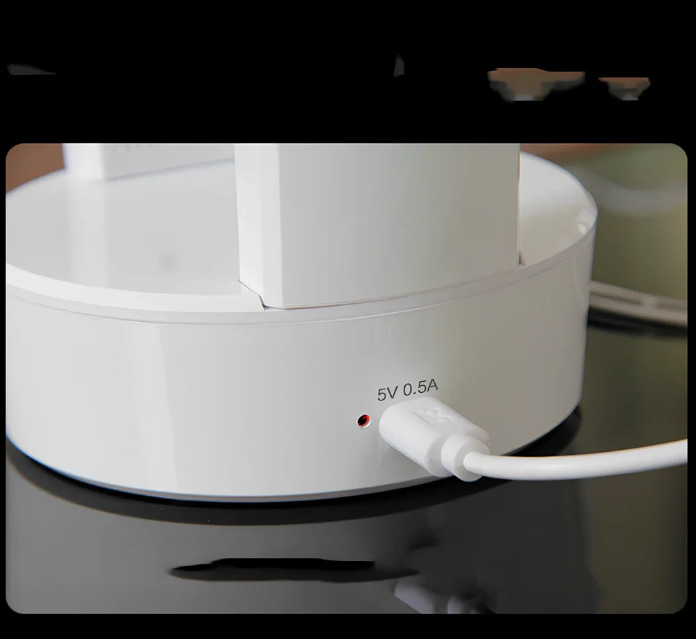White folding LED desk lamp with touch control on wooden desk