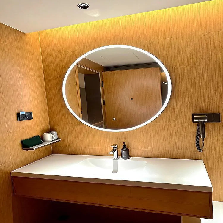 Round wall-mounted smart bathroom mirror with black aluminium alloy frame and touch-controlled LED lighting