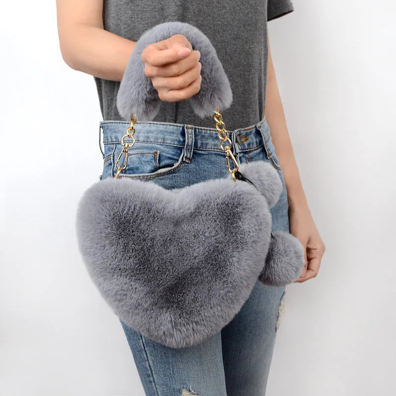 Women's soft plush heart-shaped handbag with shoulder strap in multiple solid colours