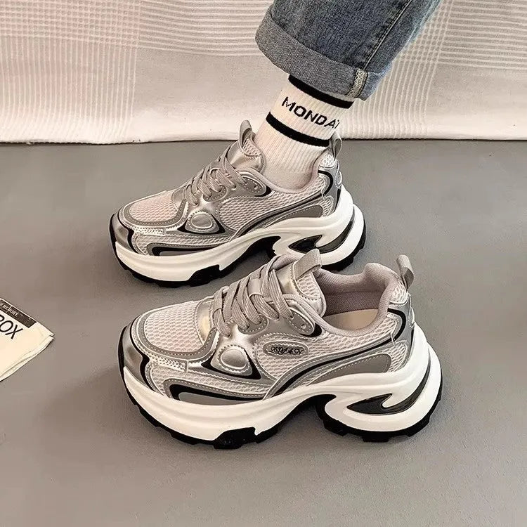 Women's silver and red mesh breathable platform sneakers with a round toe and lace-up front.