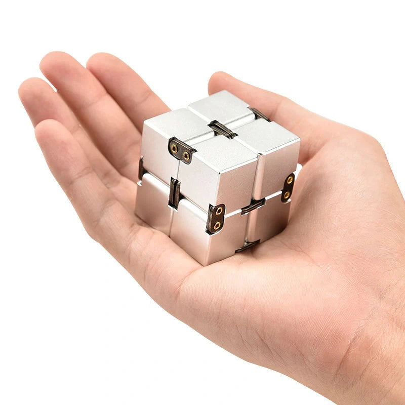 Infinity Cube decompression toy in zinc alloy with 360-degree rotation capability