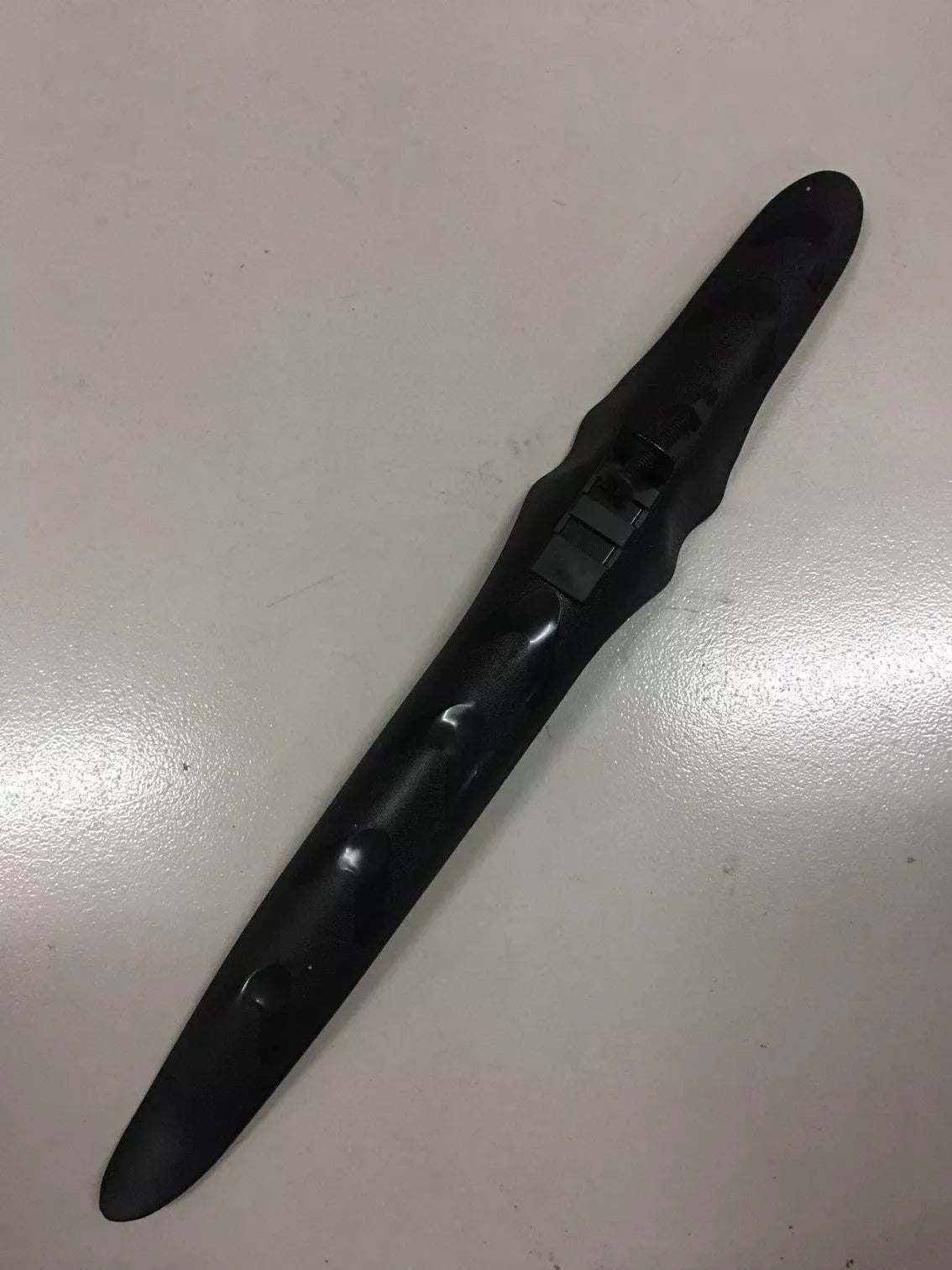 Road bike mudguard with durable plastic construction, perfect fit for clean rides