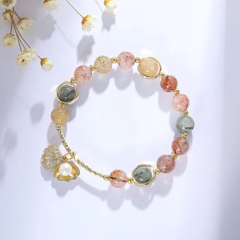 Women's cartoon style crystal bracelet with colourful hair crystal shell and red sealant flower shell designs