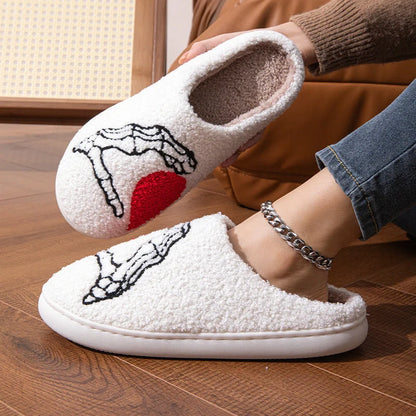 Halloween skull-hand non-slip slippers in white and black with suede uppers