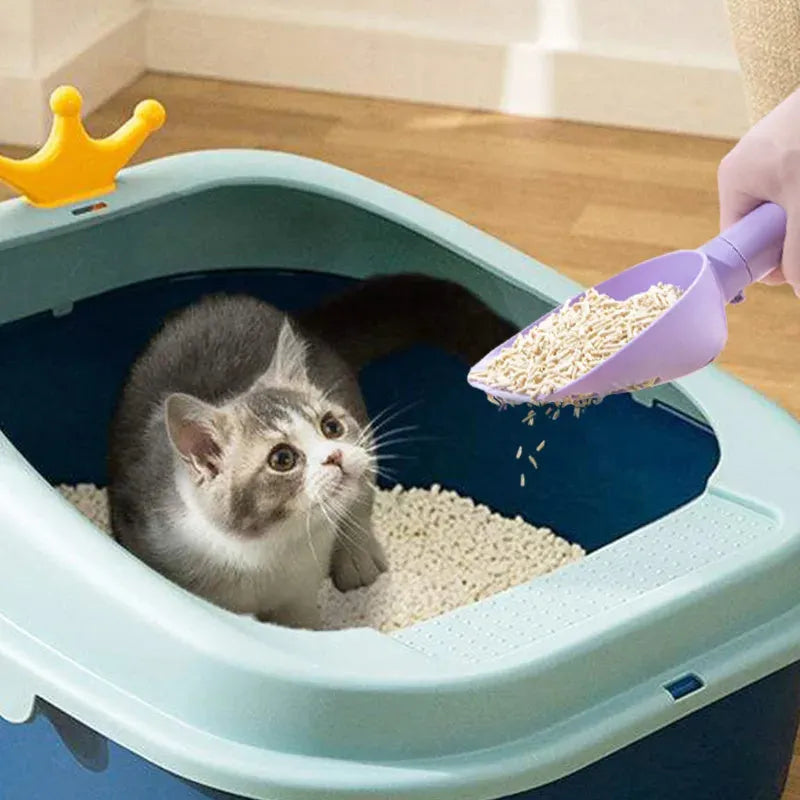 White ABS plastic cat litter scoop with storage base and hidden bag compartment