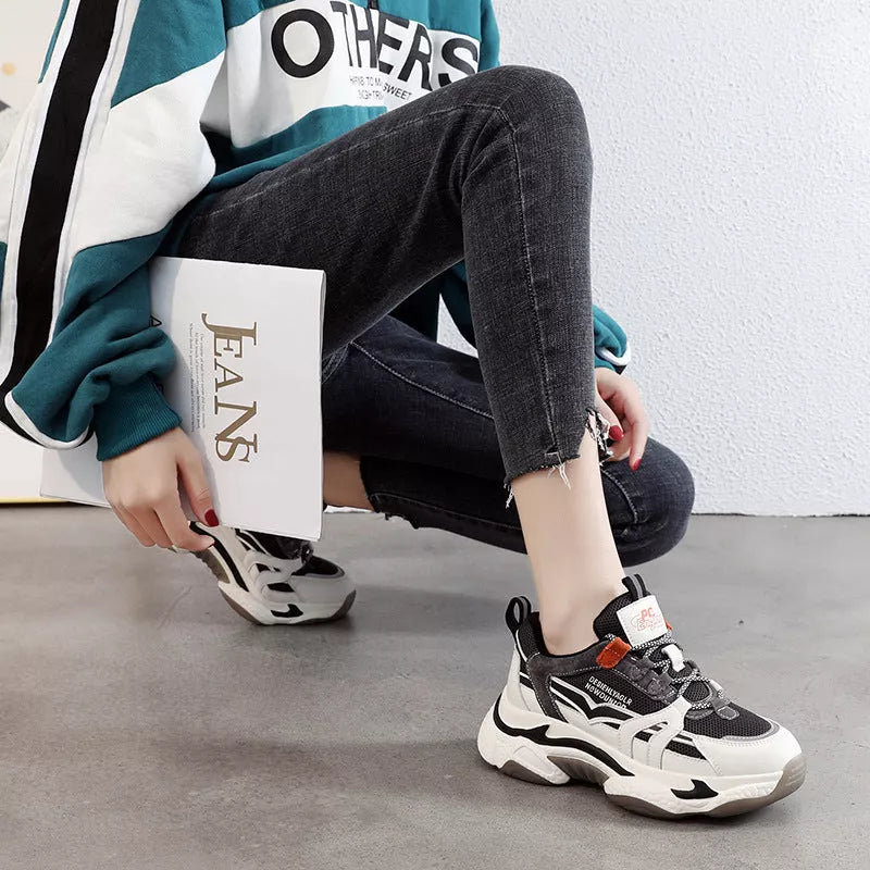 Thick-soled casual sports shoes in green and orange with leather and mesh upper