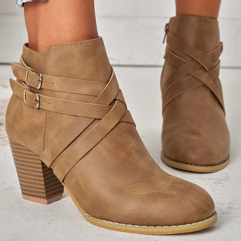 Women's plus size black PU leather short ankle boots with a 7cm heel and side zipper.