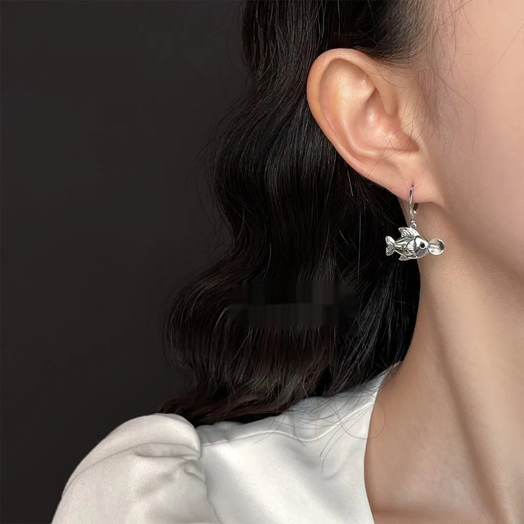 Bubble fish design copper earrings with electroplated finish showing goldfish modelling
