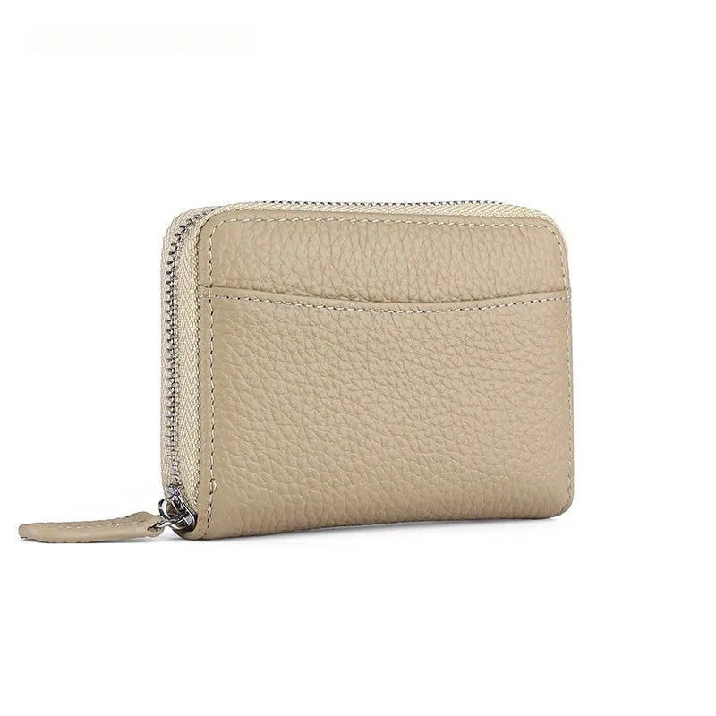 Genuine leather men's and women's zipper coin storage purse in black with sewing line detail.