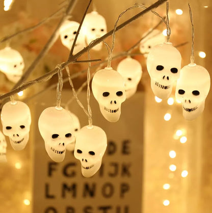 Battery-powered LED skeleton skull string lights for Halloween decor with durable plastic construction