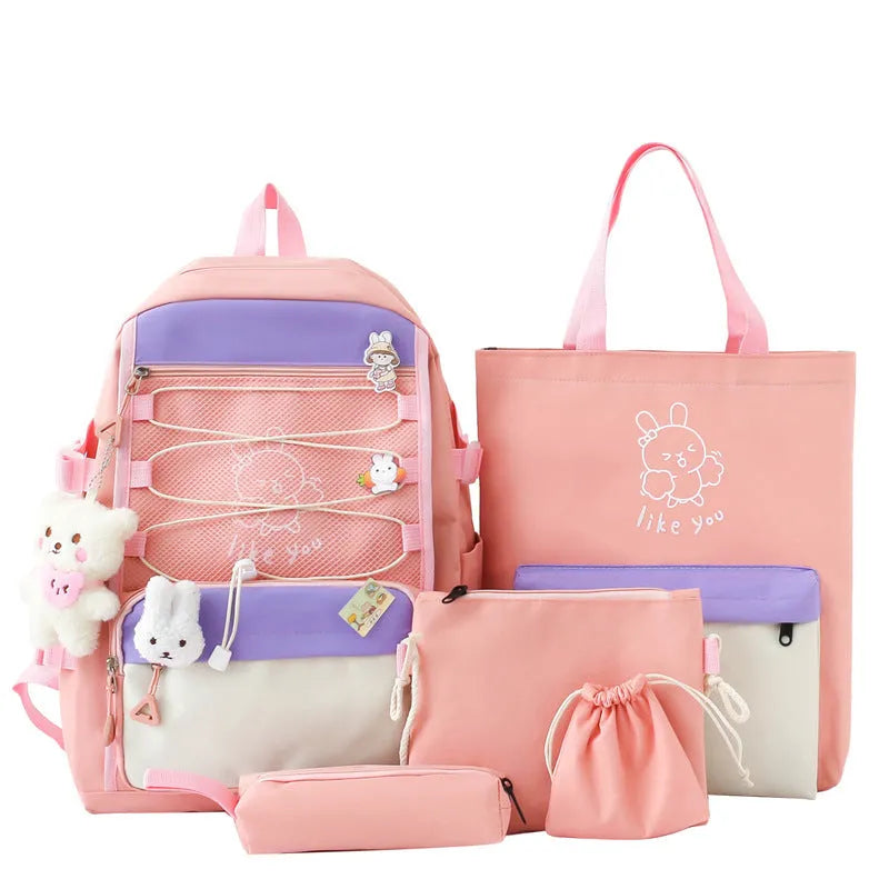 Nylon junior high school backpack in solid colour with curved shoulder straps and organisational compartments