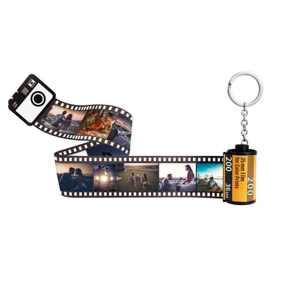 Yellow plastic film roll keychain with custom photo insertion compartment measuring 7cm