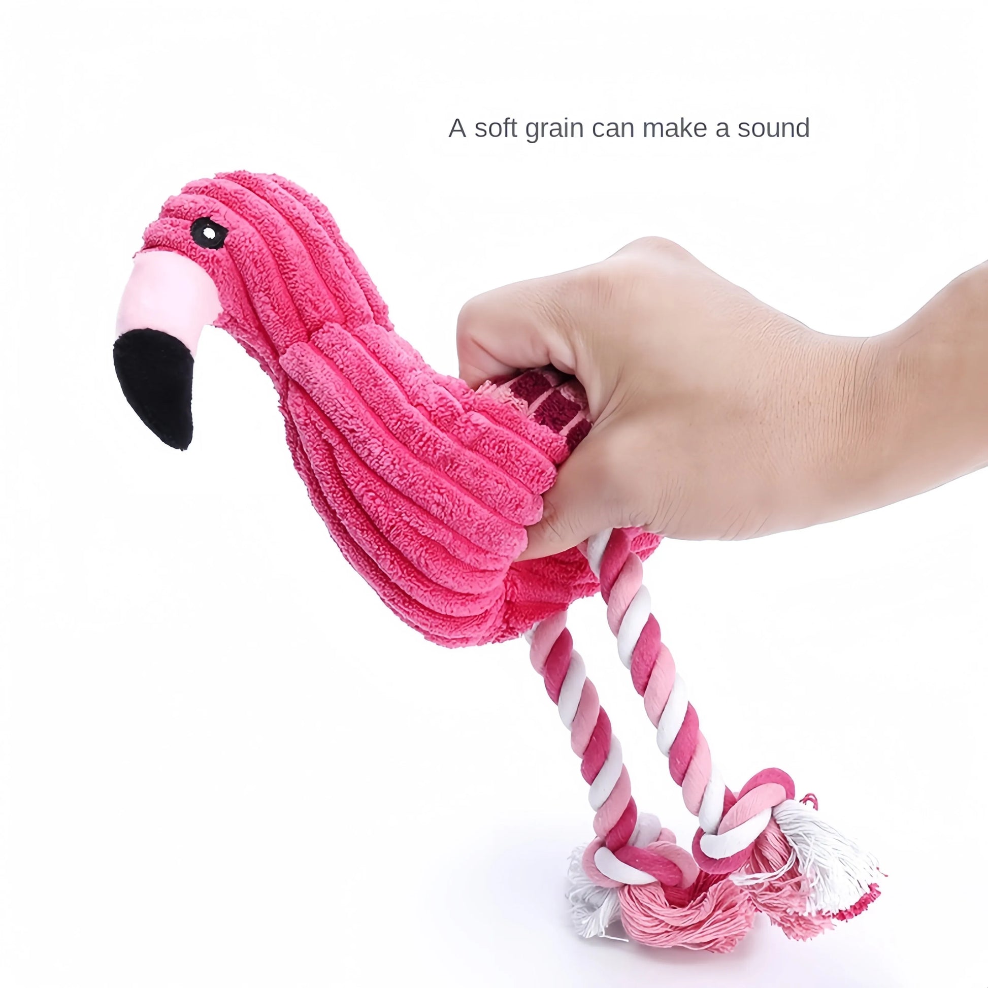Four pink animal-shaped corduroy dog toys with squeakers arranged together