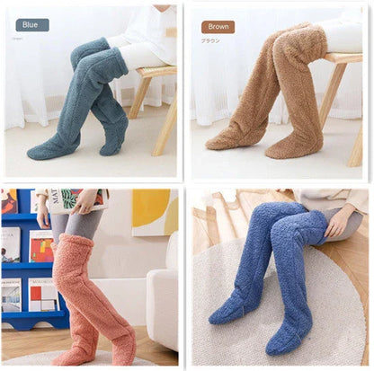 Cozy over-the-knee fuzzy socks in various colors, including brown, blue, dark gray, pink, silver, and more. Comfortable cotton design for warm, snug legs.