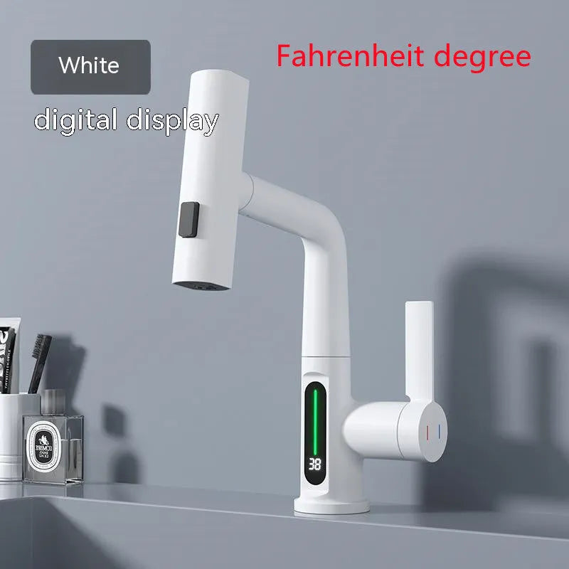 Modern digital display kitchen tap with pull-out spray hose showing LED temperature screen.