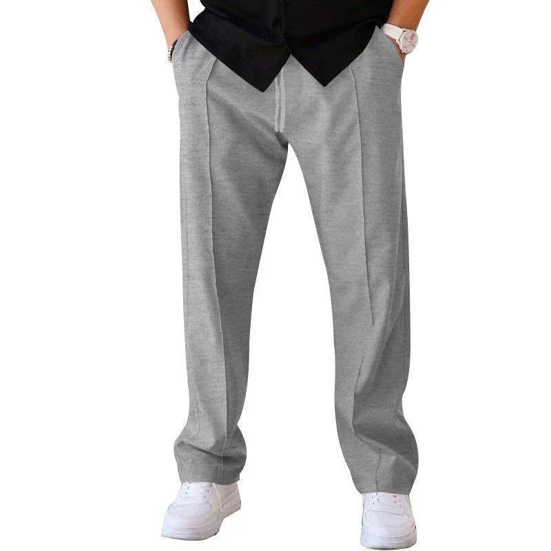 Relaxed fit drawstring waist sports pants for men in various colors and sizes