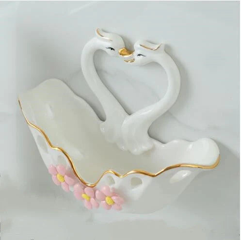 Ceramic swan soap box with suction cup in green, white, and pink