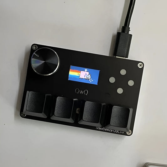Magnetic axis numeric game keypad with programmable knob and colour screen on desk