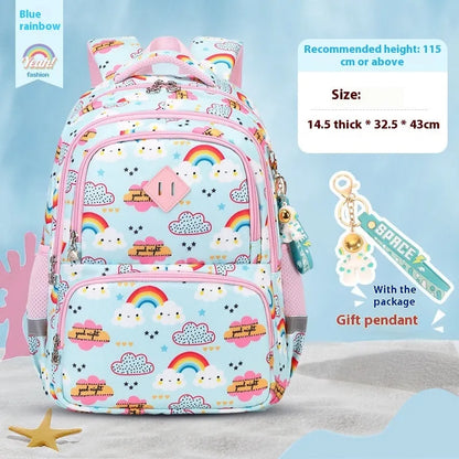 Blue dinosaur print children's school backpack with curved shoulder straps on a grey background