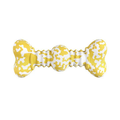 Natural rubber dog chew toy with camouflage design for aggressive chewers, USDA organic certified, in green, white, and yellow colours.
