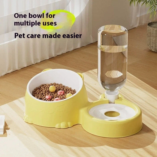 Green automatic cat water basin with two stainless steel bowls on ceramic base