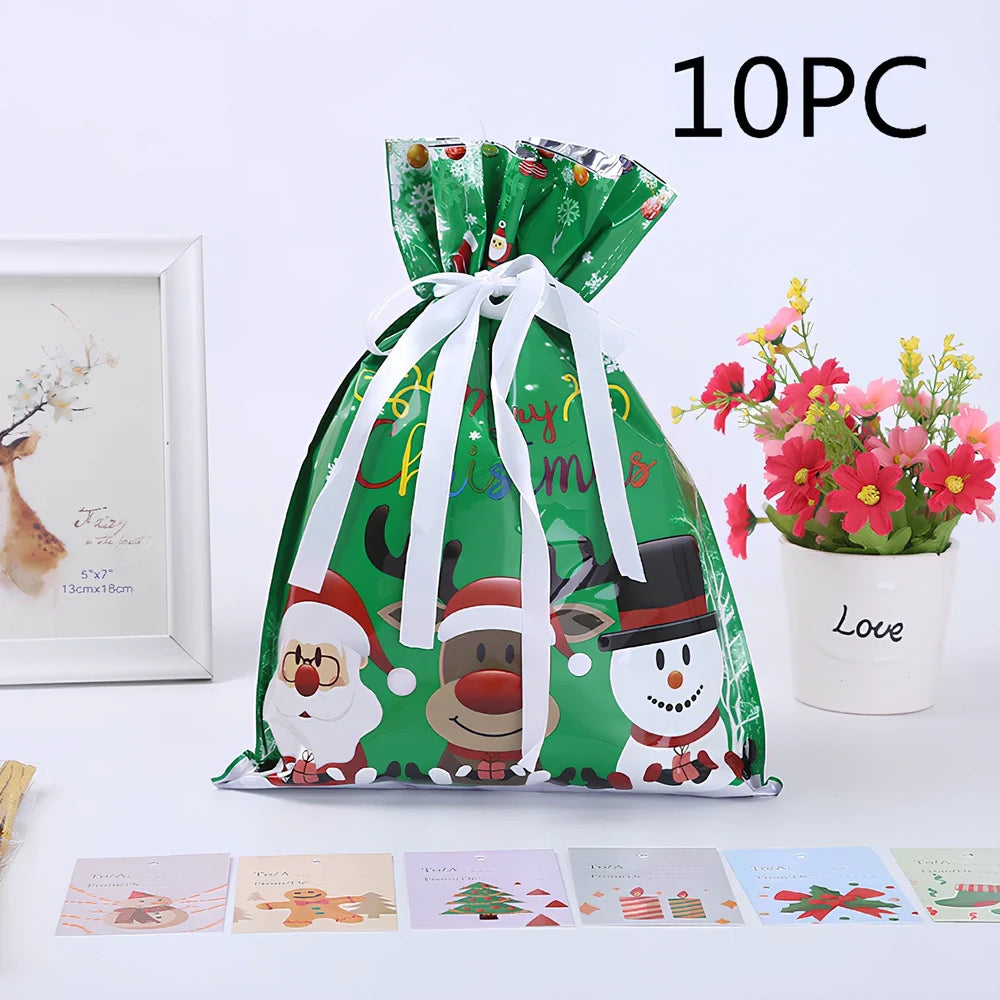 Christmas gift bag with drawstring closure in laser gold finish, 32x24cm dimensions