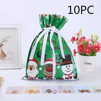 Christmas gift bag with drawstring closure in laser gold finish, 32x24cm dimensions