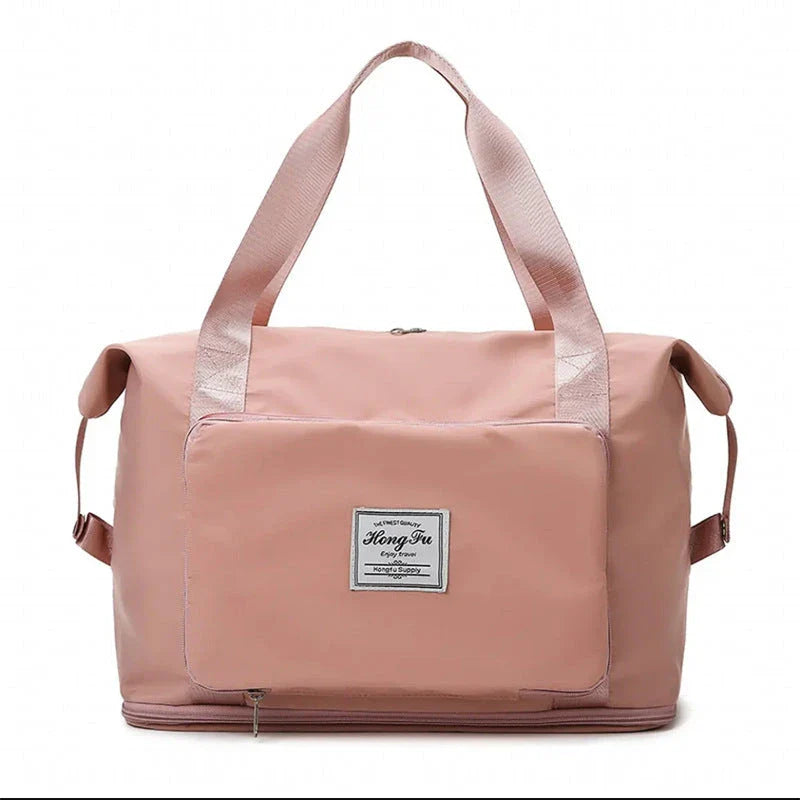 Roomy and foldable gym bag for women with waterproof Oxford fabric, multiple pockets, and wet/dry separation compartment