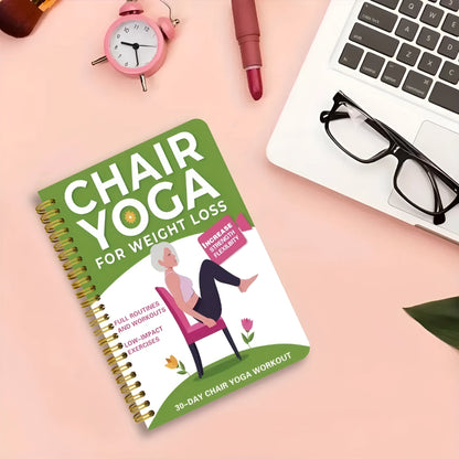 Green coil-bound 30 day chair yoga training notebook open to daily plan pages