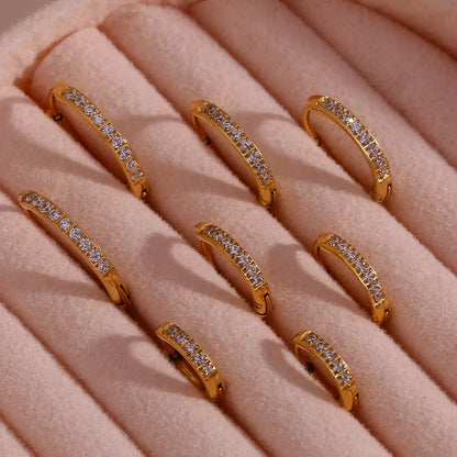 Women's titanium steel rounded edge zircon earrings in gold and steel finishes, sizes 10mm to 16mm